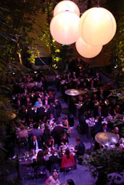 Guests dined at conversation-facilitating narrow tables.