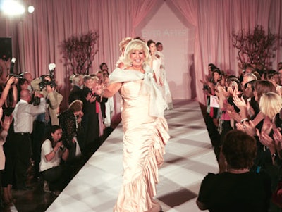 Breast cancer survivors received a standing ovation as they walked the catwalk during the evening's fashion show.