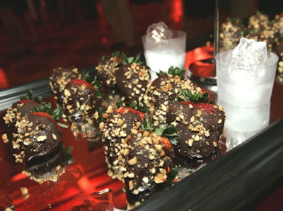 Aaron's Catering used innovative methods for serving dessert by placing chocolate-covered strawberries on a long mirror carried by two waiters.