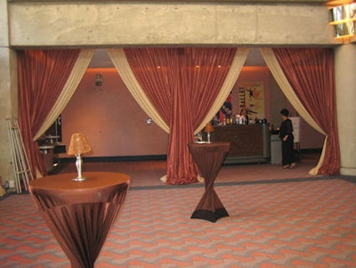 Draping the lobby with copper and gold sequined chiffon panels, conceptBAIT created a glittery effect as the sun streaked through during the cocktail hour.