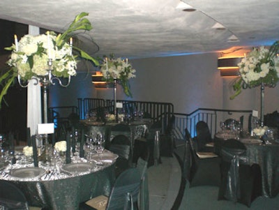 Metallics were the colors of the evening both in the lobby and in the dining area as tables and place settings included pewter, platinum, and black elements.