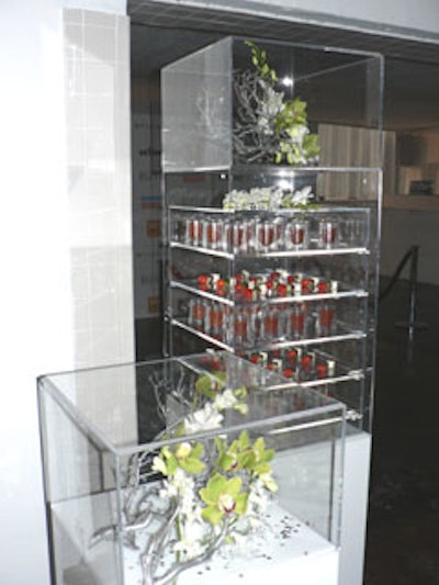 Trays of gazpacho and fruit salad were stacked in Lucite shelves, allowing servers easy access to the food and creating a unique design element.