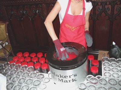 Whiskey glasses with the Maker's Mark logo were hand-dipped in the liquor's signature red wax right at the bar.