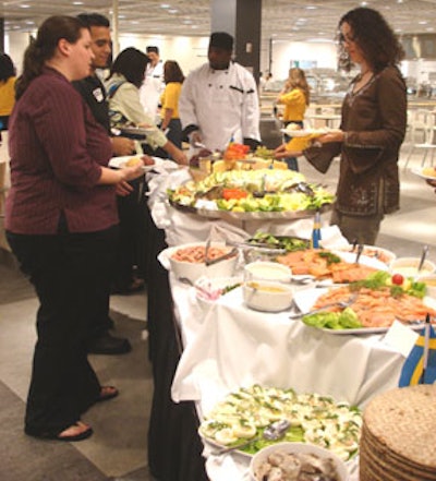 South Florida press members lined up to sample the buffet of Swedish delicacies.