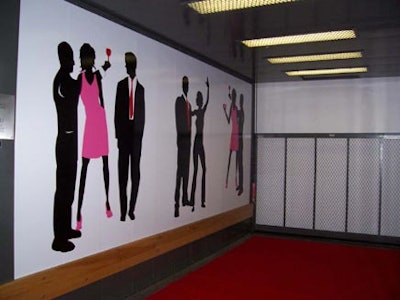 Decals from Image Digital and a red carpet helped disguise the utilitarian nature of the freight elevator.