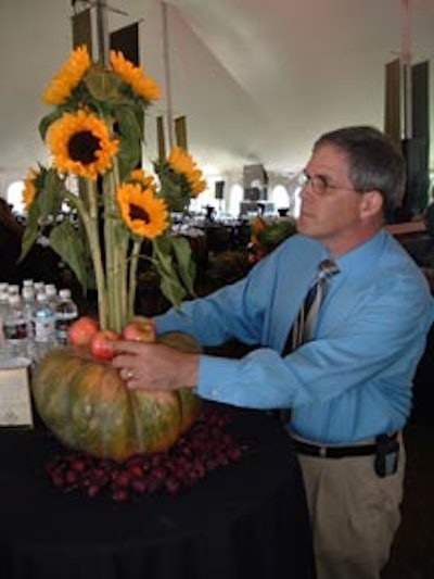 Pumpkins supporting sunflowers provided punctuation points on the serving tables.