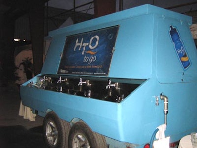 The City of Toronto poured free tap water from an HTO to a Go mobile water tank.
