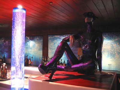 Specially designed one-of-a-kind scuba girls complement the Fathom 22 Bar.