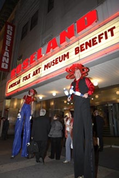 Stiltwalkers welcomed attendees to Roseland Ballroom for the carnival-themed benefit.