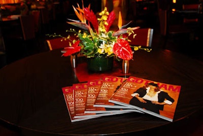 Minimal decor touches at the Gotham party included tropical floral arrangements and copies of the bachelor issue.