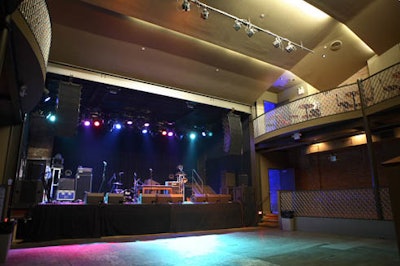 The music room has a large stage and 28-foot-high ceilings.