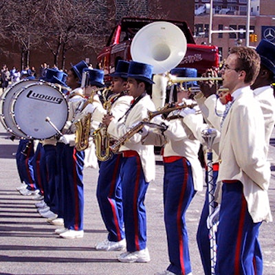 The New York City All-High School Marching Band performed for the crowd of eager auto show attendees.