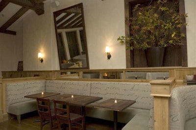 The entire space, including the main dining area (pictured), has a neutral color palette and small details that reference Washington Irving.