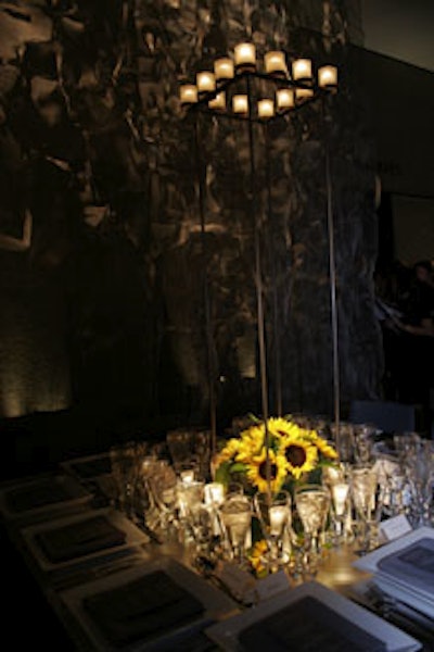 Clusters of sunflowers on each table echoed Close's large tapestry of a single stem of the flower.