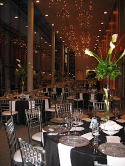 Calla lilies topped tables draped in black silk-blend cloths at the dinner portion of Operanation.