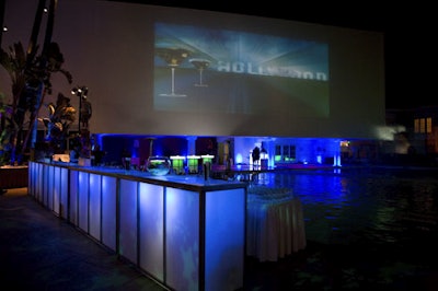 A glut of illuminated bars and buffets dotted the poolside party space.