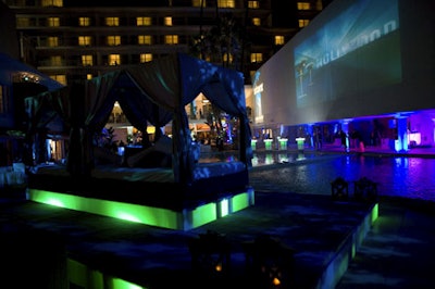 A fabric-covered bed sat in the designated outdoor smoking area.