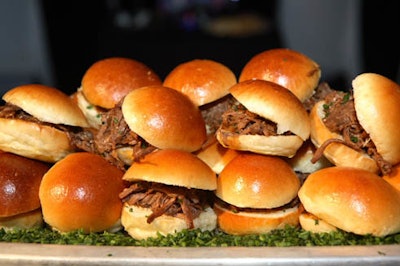Among the comfort foods at the buffet stations were pulled-pork sandwiches served on mini brioche rolls with barbecue sauce and papaya chutney.