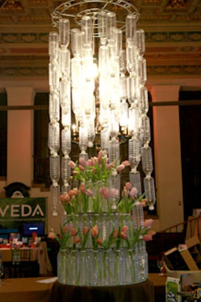 TV Design Inc. created a towering chandelier out of recycled soda bottles.