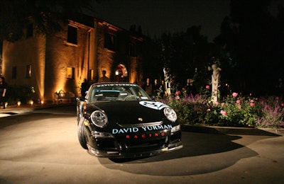 A David Yurman-logoed racing car was parked in the roundabout driveway.