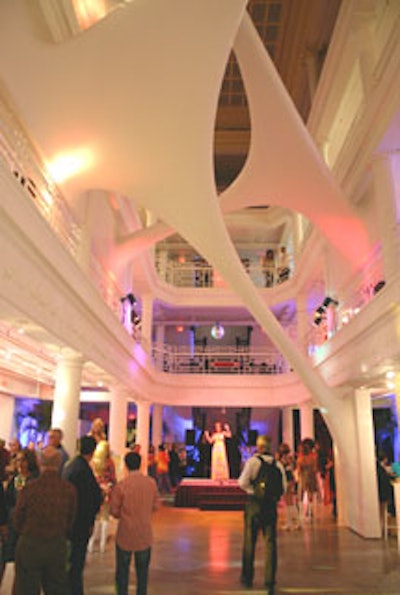 The Moore Building, with its stretch-fabric installation, provided a striking backdrop to the '70s-themed event.