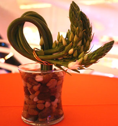 The high-top cocktail tables were garnished with petite centerpieces.