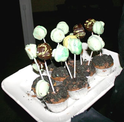 Decadent desserts provided by event caterer Grass Restaurant included chocolate mousse cake topped with mint macaroons.