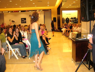 Breast cancer survivors hit the runway and modeled the latest fashions available at Saks.