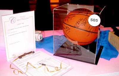 A basketball signed by the whole Miami Heat team was one of many high-end items up for bid at the evening's silent auction.
