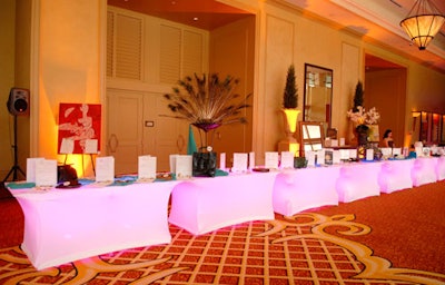 So Cool Events provided their spandex-covered tables for the silent auction that spanned the ballroom's prefunction space.