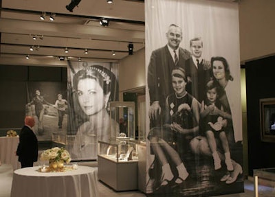 Banners displaying black-and-white images of Kelly hung from the ceiling throughout the space.