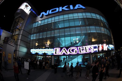 Visitors swarmed the mezzanine and loge entrance on opening night.