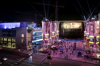 Skytrackers illuminated the night sky to announce the venue's opening.