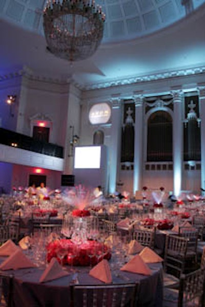 Partially inspired by the venue's chandelier, the night's design included sparkling miniature chandeliers as centerpieces for each table.