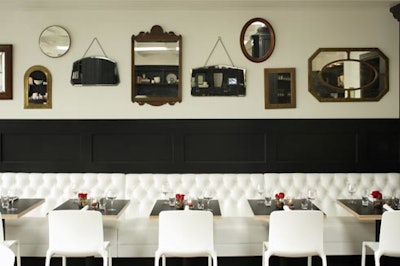 Comme Ca's main dining room uses classic brasserie accents like antique mirrors, but has a contemporary edge.