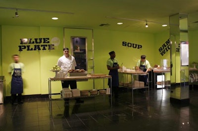 Vivid green walls marked the front area where consumers lined up to purchase gourmet lunch items. The café used biodegradable cutlery and plates made from 100 percent organically grown bamboo.