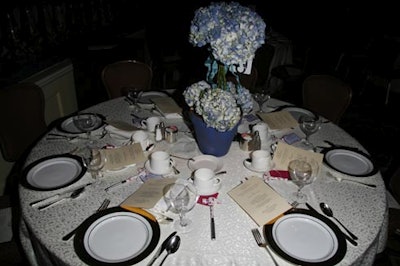Potted hydrangeas in pink or blue served as table centerpieces.