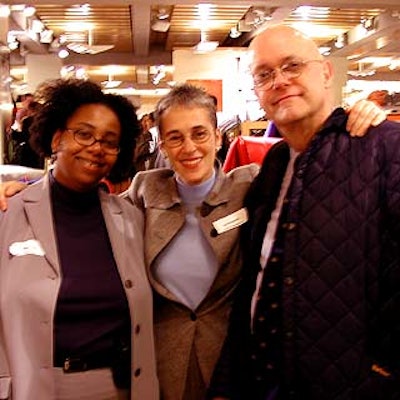 Great Performances' director of business development Trey Moynihan, owner and president Liz Neumark and general manager Paul Sharon at the NYC & Company business card exchange at the NBA Store.