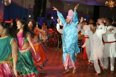 Twelve members of the dance troupe Dhoonya Dance performed a high-energy routine as guests entered the ballroom.