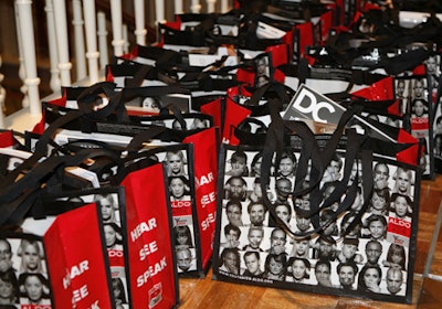 The swag bags were reusable and decorated with images from the 'Aldo Fights AIDS' campaign. They were filled to the brim and included MAC lip gloss, DC and Good magazines, a $25 gift certificate to Saks Fifth Avenue, Illy coffee, and a caramel apple.