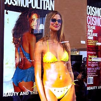 Models posed in the windows of the Sephora store in Rockefeller Center for a swimsuit fashion show sponsored by Cosmopolitan.