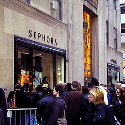 The swimsuit fashion show drew a crowd of people walking down Fifth Avenue.