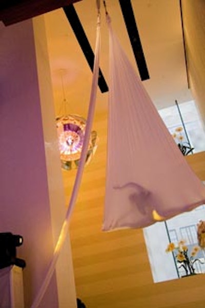 Aerial Artistry Inc. performed at Louis Vuitton's Fifth Avenue boutique.