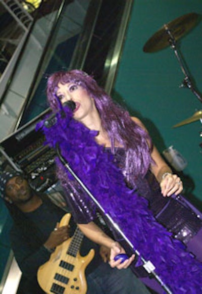 A purple-clad singer of the headlining band entertained hundreds of guests throughout the evening.