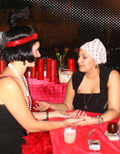 Fortune tellers were set up in the gardens behind the house offering palm and tarot card readings.