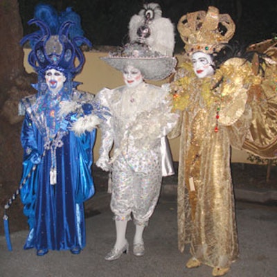 The winners of the costume contest posed for photographers in their homemade costumes and headdresses.