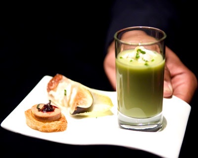 Restaurant Associates presented guests with hors d'oeuvre trios featuring foie gras canapés, figs, and endive, with a shooter of avocado soup.