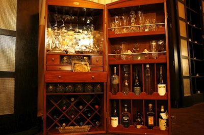 Some of the live auction items, including a Waterford bar trunk filled with crystal and sterling-silver pieces, were displayed during the cocktail hour.