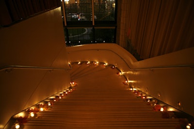 Loose leaves and votives lined the stairs.