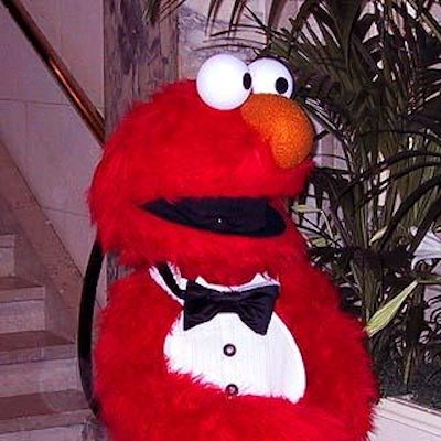 Sesame Street's Elmo greeted guests as they entered the gala.